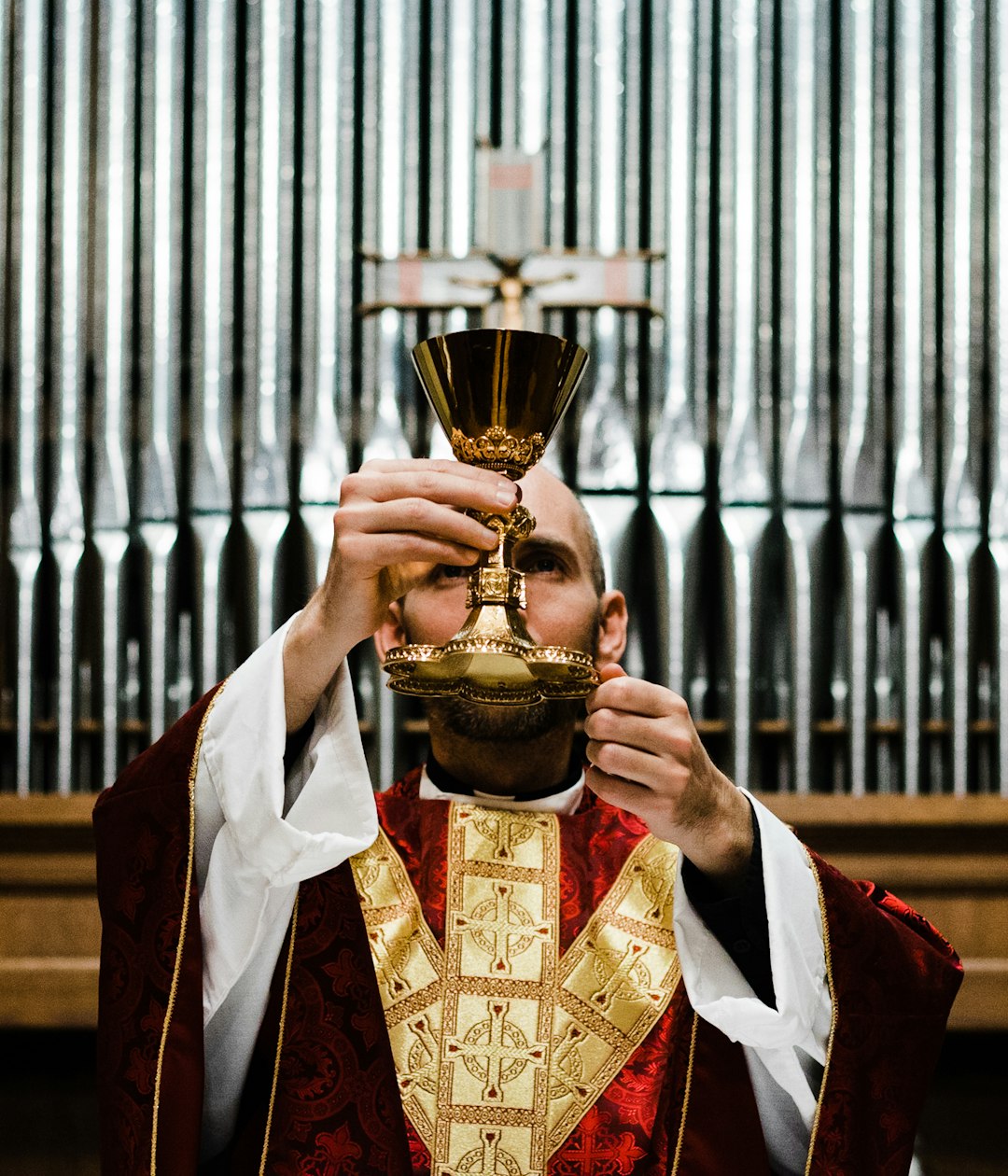 The consecration of the wine into the Precious Blood of Jesus Christ during a Catholic Mass.